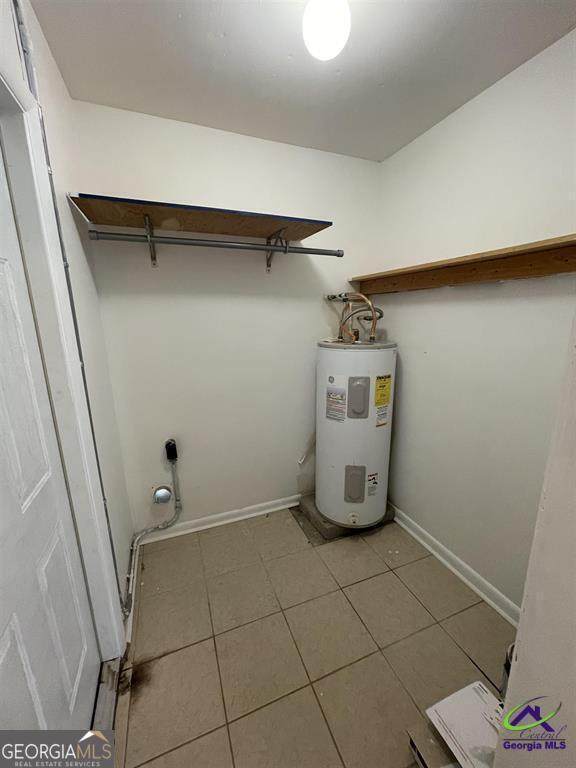321 Mary Lane Warner Robins, GA 31088 - Photo 11 of 11 a room with water heater and storage