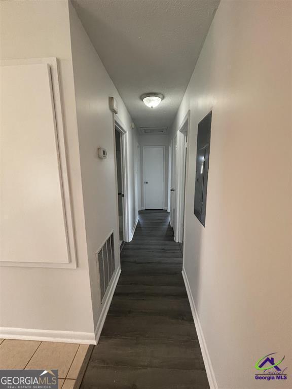 321 Mary Lane Warner Robins, GA 31088 - Photo 4 of 11 a view of a hallway with wooden floor