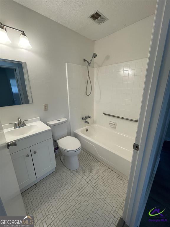 321 Mary Lane Warner Robins, GA 31088 - Photo 8 of 11 a bathroom with a sink a toilet and shower