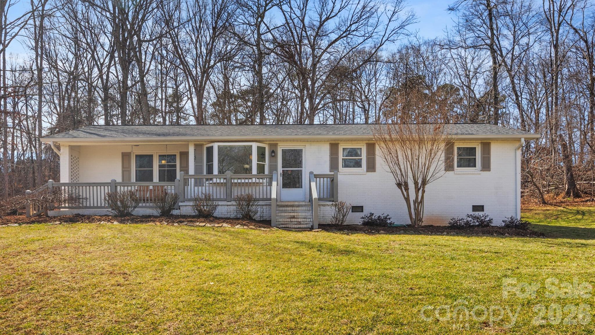 7137 Reeps Grove Church Road Vale, NC 28168 - Photo 1 of 33 a house view with swimming pool in front of it