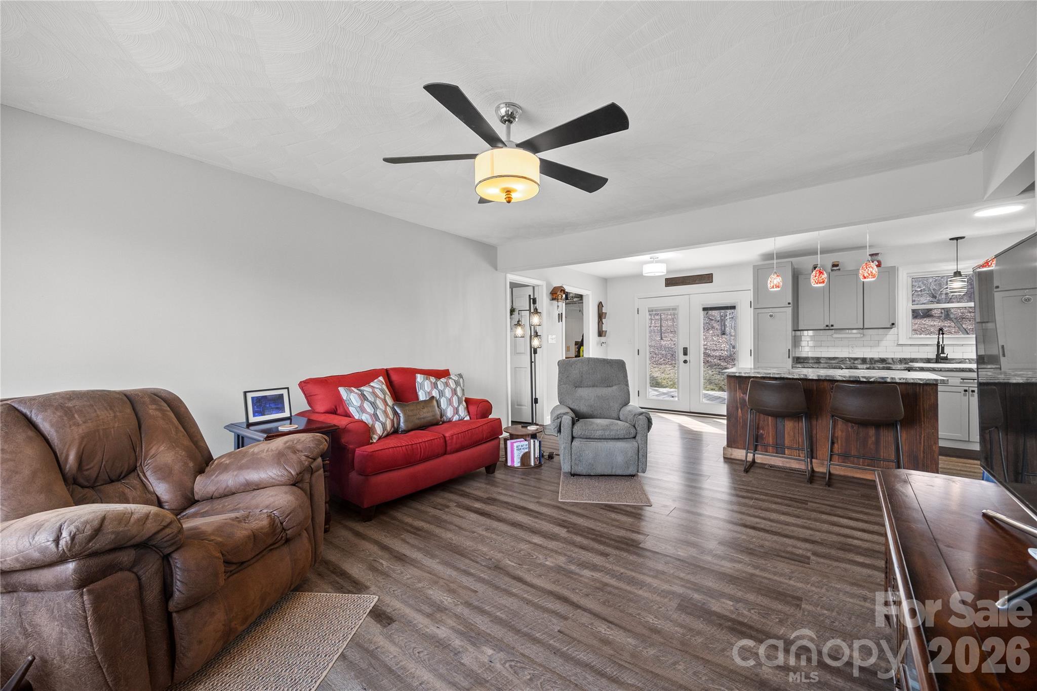 7137 Reeps Grove Church Road Vale, NC 28168 - Photo 7 of 33 a living room with furniture and a ceiling fan