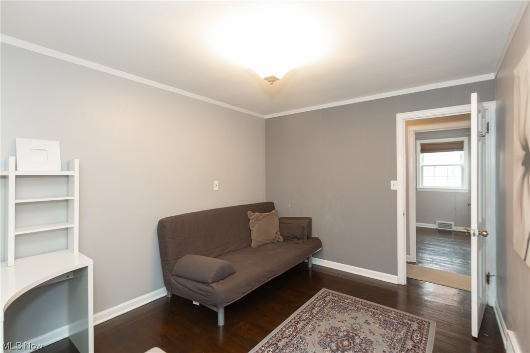 3786 Berkeley Road Cleveland Heights, OH 44118 - Photo 17 of 29 Sitting room featuring ornamental molding and dark wood-type flooring