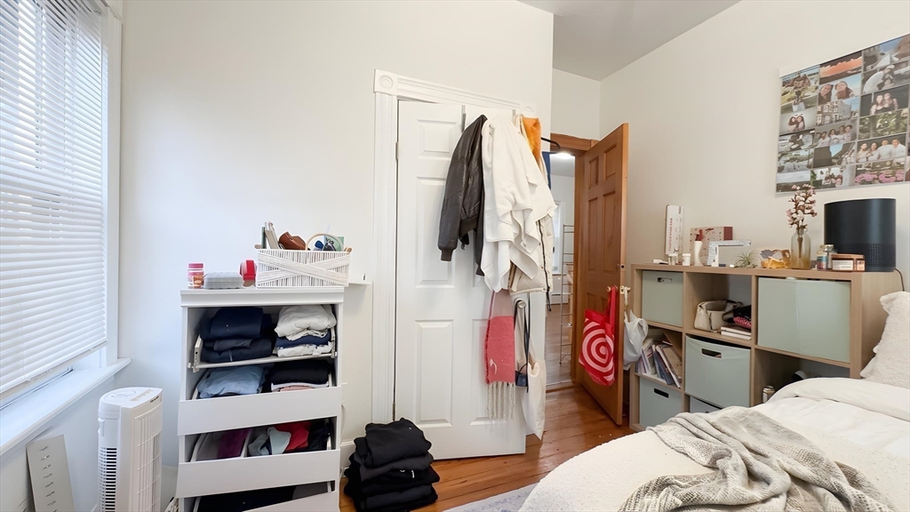 26 Darling Street, Unit 2 Boston, MA 02120 - Photo 7 of 15 a bedroom with a bed and a closet