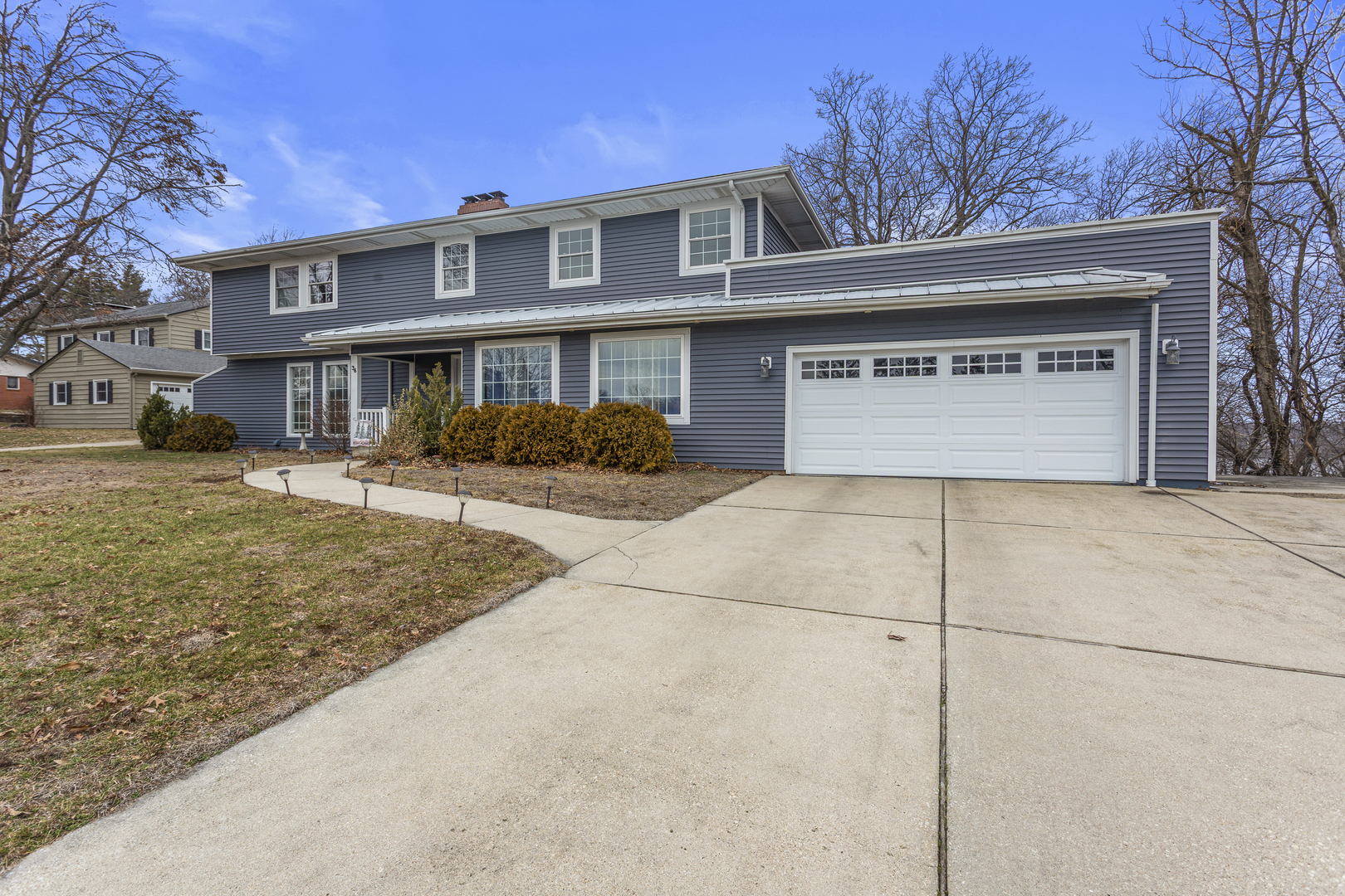 36 Allen Bend Drive Decatur, IL 62521 - Photo 2 of 39 a front view of a house with a yard and garage