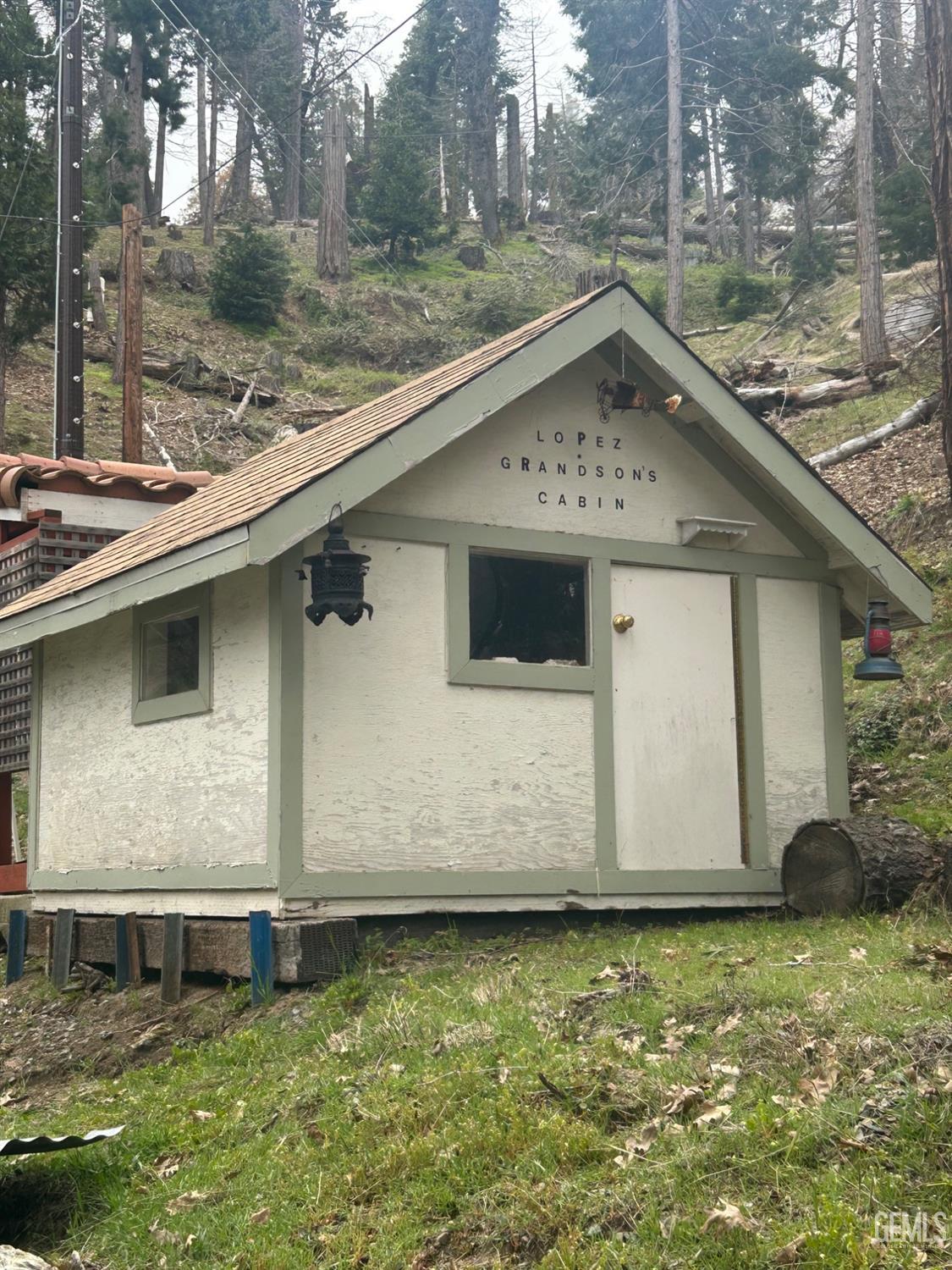 Undisclosed Address Posey, CA 93260 - Photo 12 of 20 a view of a house with backyard
