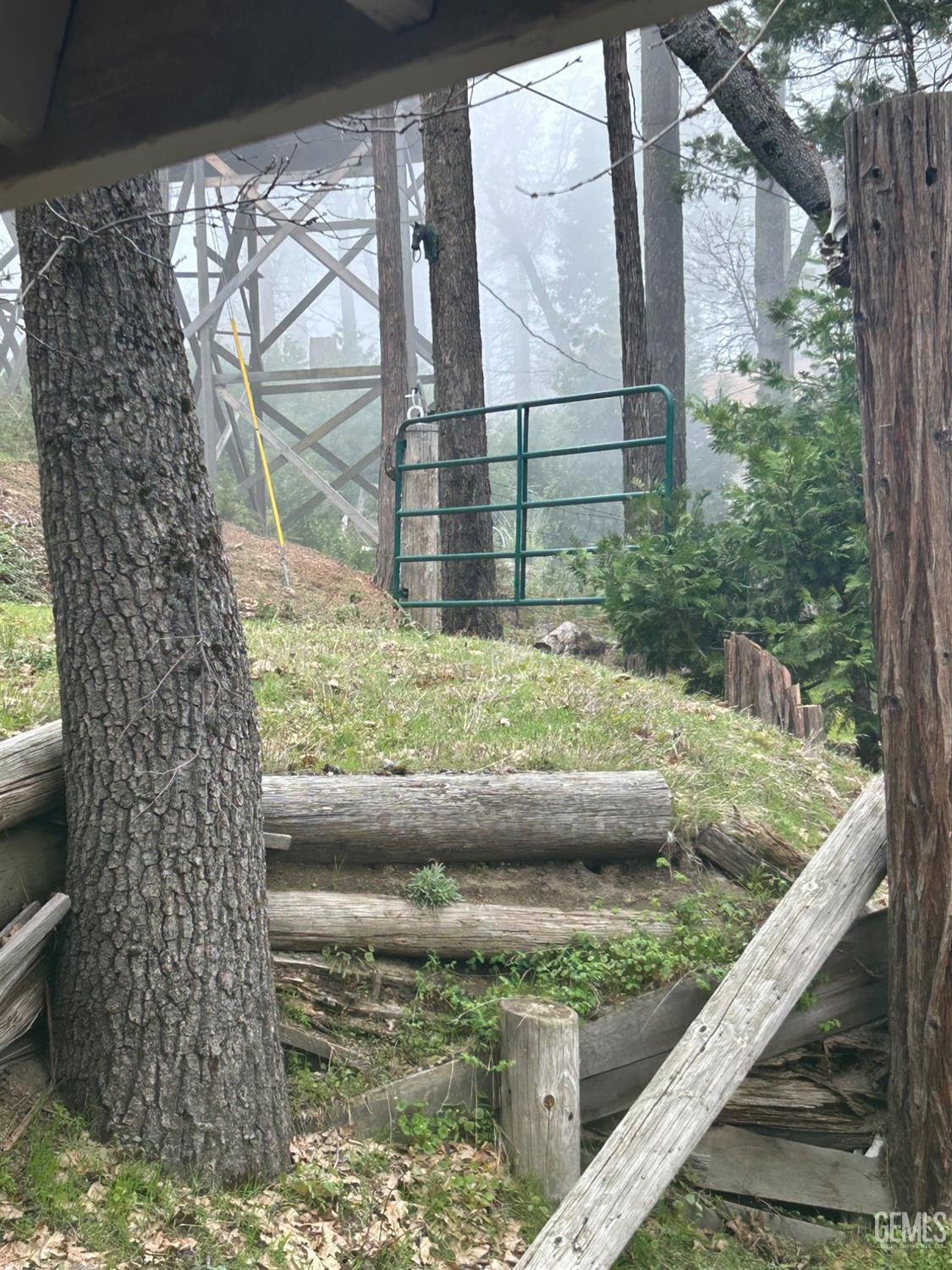 Undisclosed Address Posey, CA 93260 - Photo 17 of 20 a view of a garden from a balcony