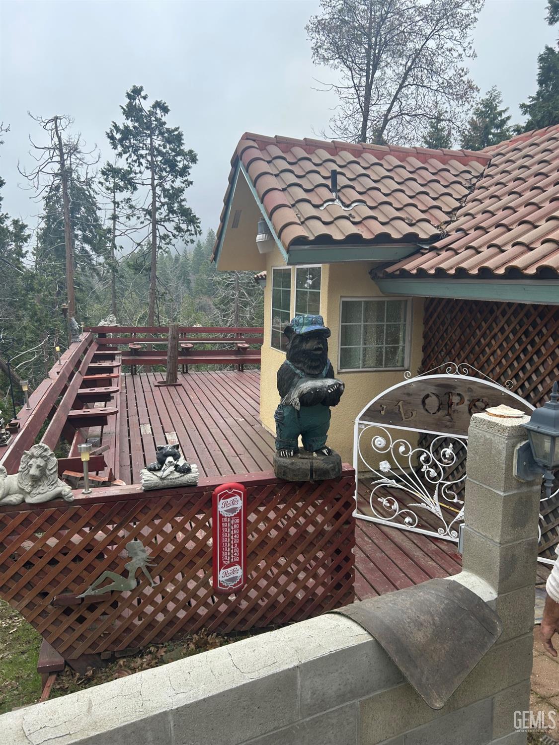 Undisclosed Address Posey, CA 93260 - Photo 2 of 20 a view of a roof deck with couches and wooden fence