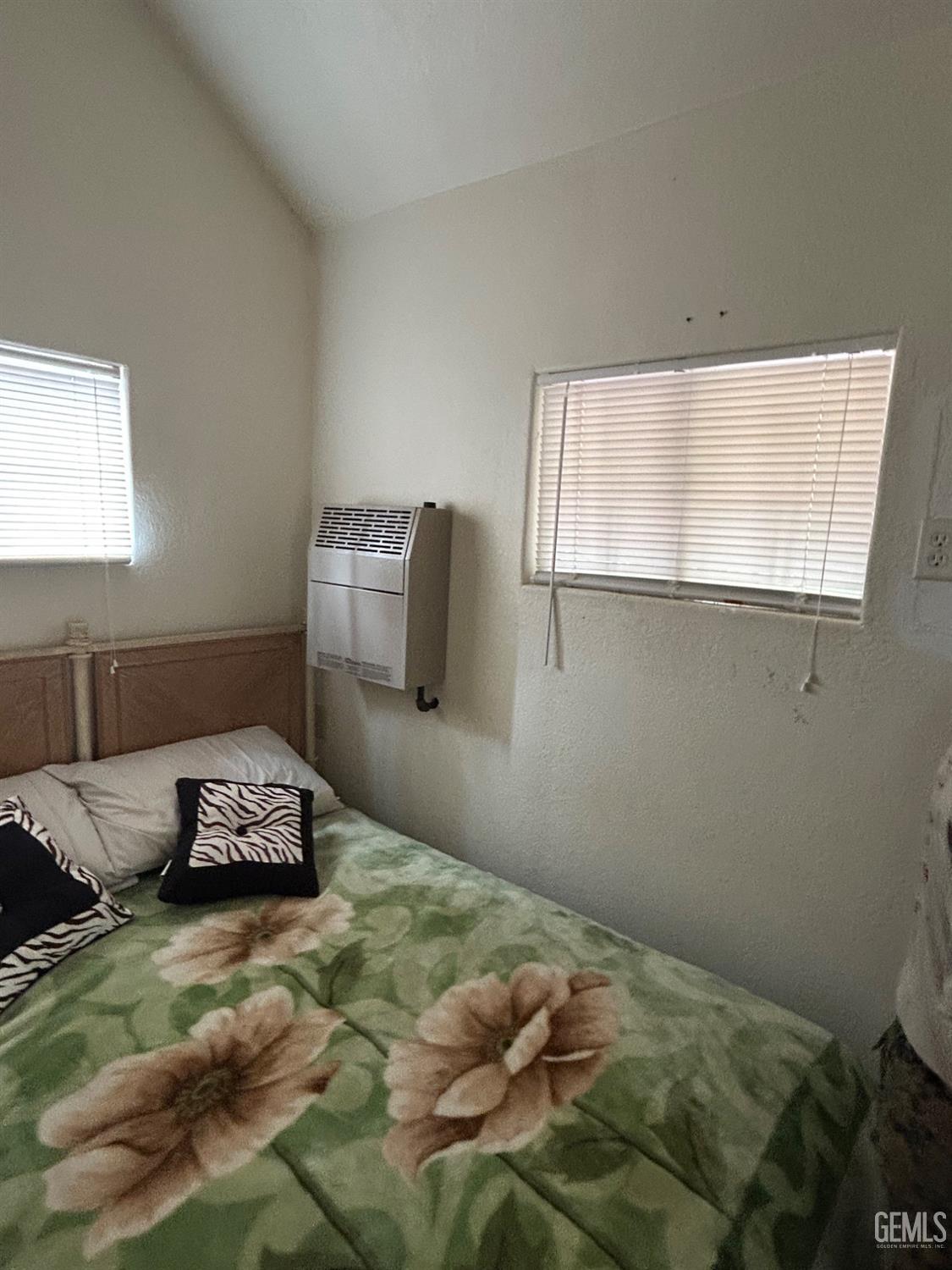 Undisclosed Address Posey, CA 93260 - Photo 6 of 20 a bedroom with a bed and a window
