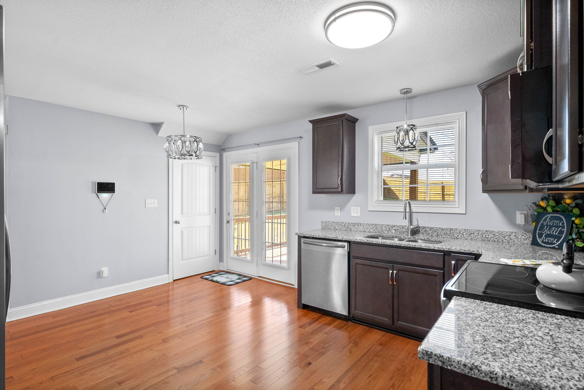 1145 Racker Drive Clarksville, TN 37043 - Photo 12 of 44 a spacious bathroom with a granite countertop sink and a mirror