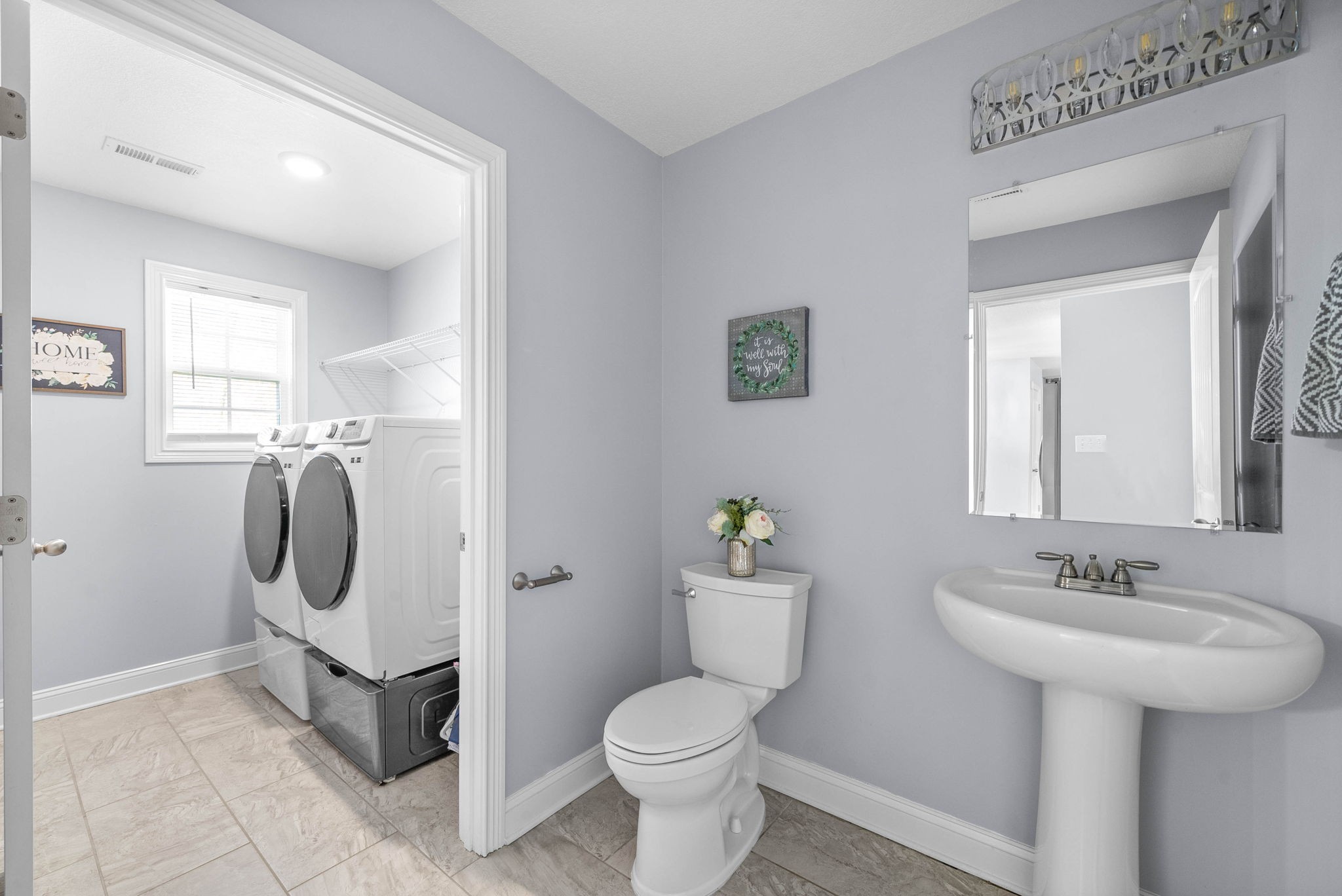 1145 Racker Drive Clarksville, TN 37043 - Photo 15 of 44 a bathroom with a sink toilet and shower