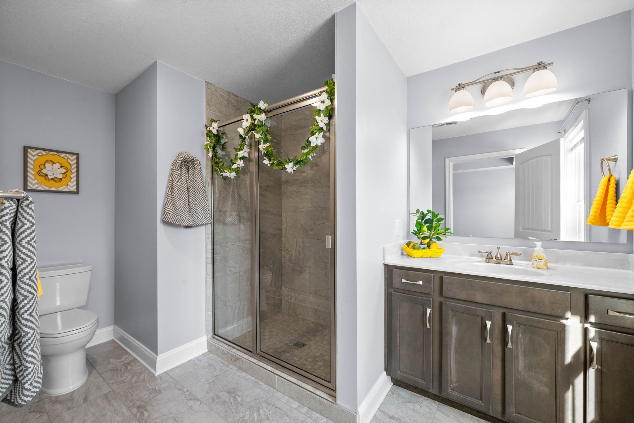 1145 Racker Drive Clarksville, TN 37043 - Photo 22 of 44 a bathroom with a granite countertop sink a toilet and shower