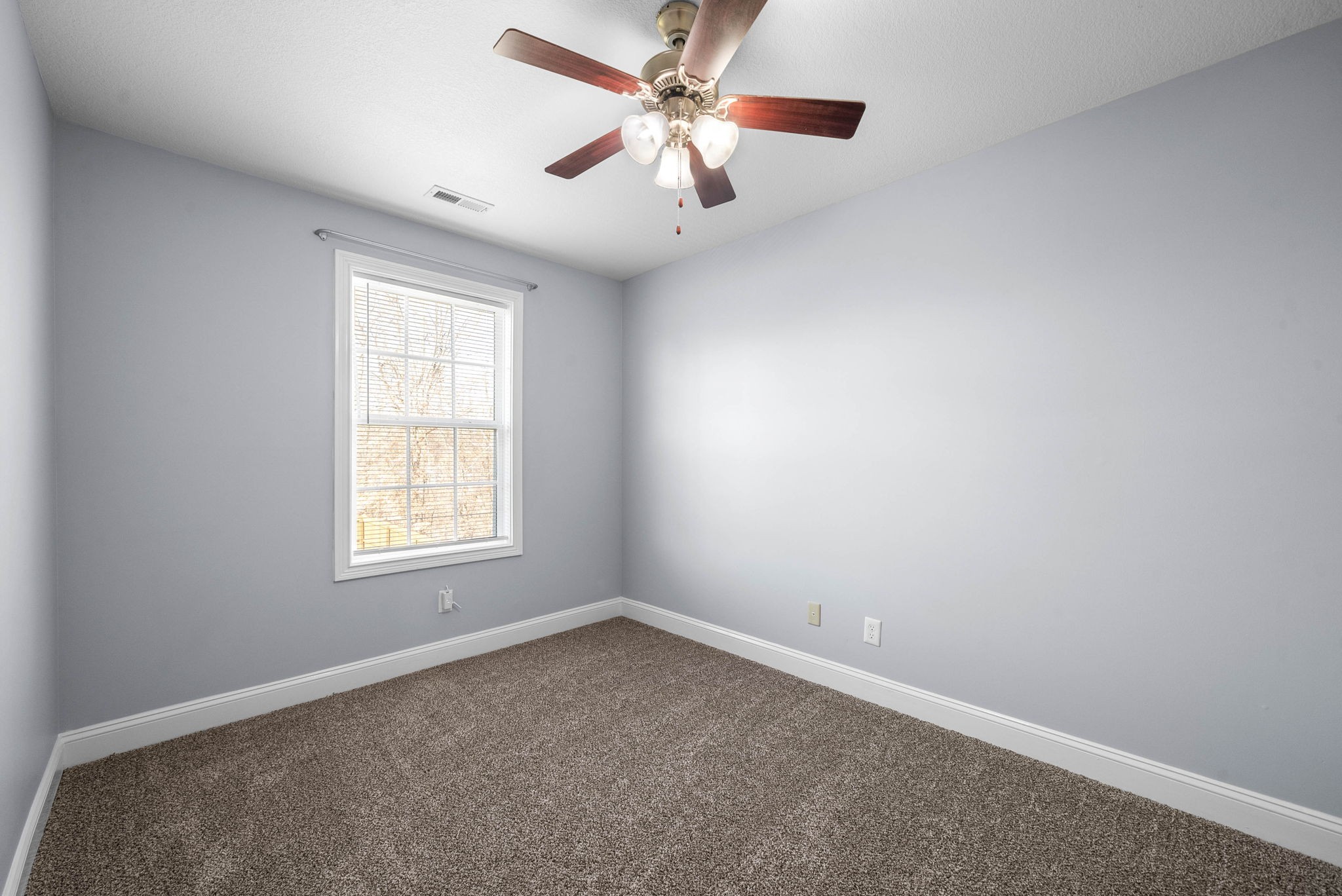 1145 Racker Drive Clarksville, TN 37043 - Photo 24 of 44 an empty room with a window and a fan