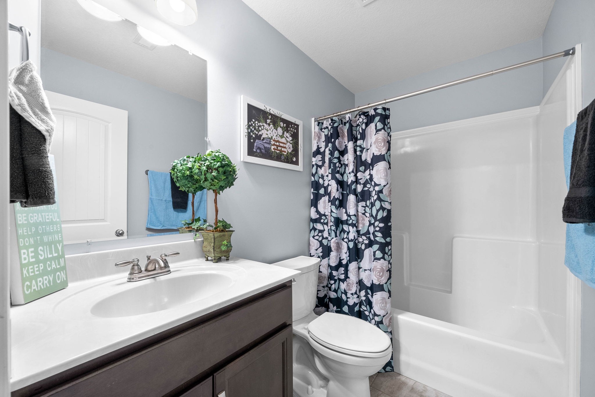 1145 Racker Drive Clarksville, TN 37043 - Photo 26 of 44 a bathroom with a sink toilet and shower