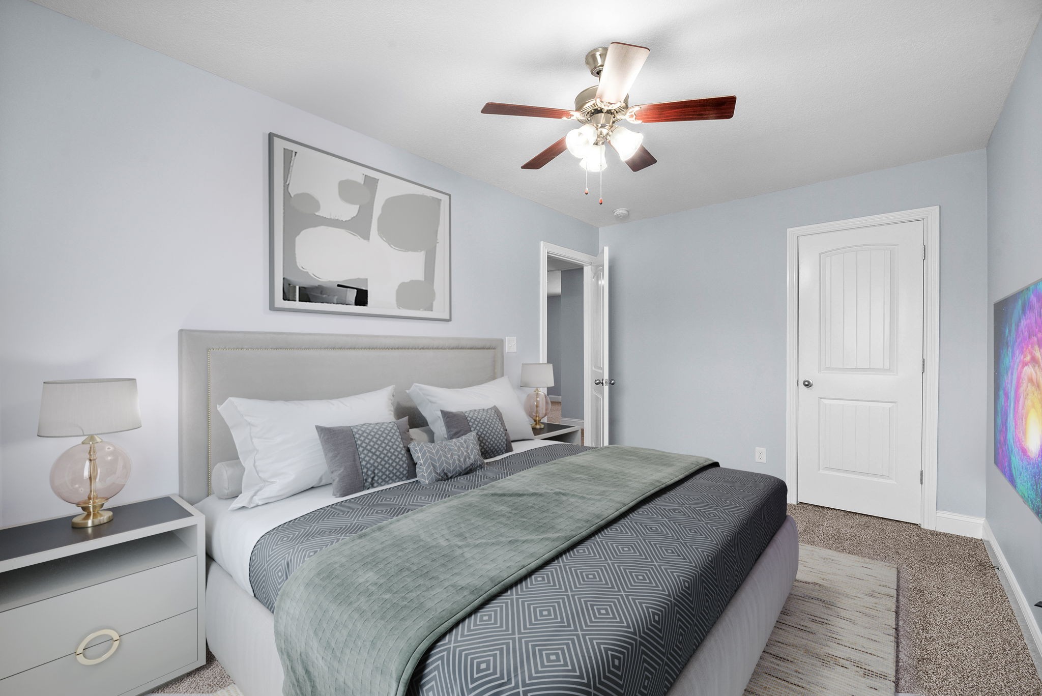 1145 Racker Drive Clarksville, TN 37043 - Photo 27 of 44 a bedroom with a large bed and a chandelier