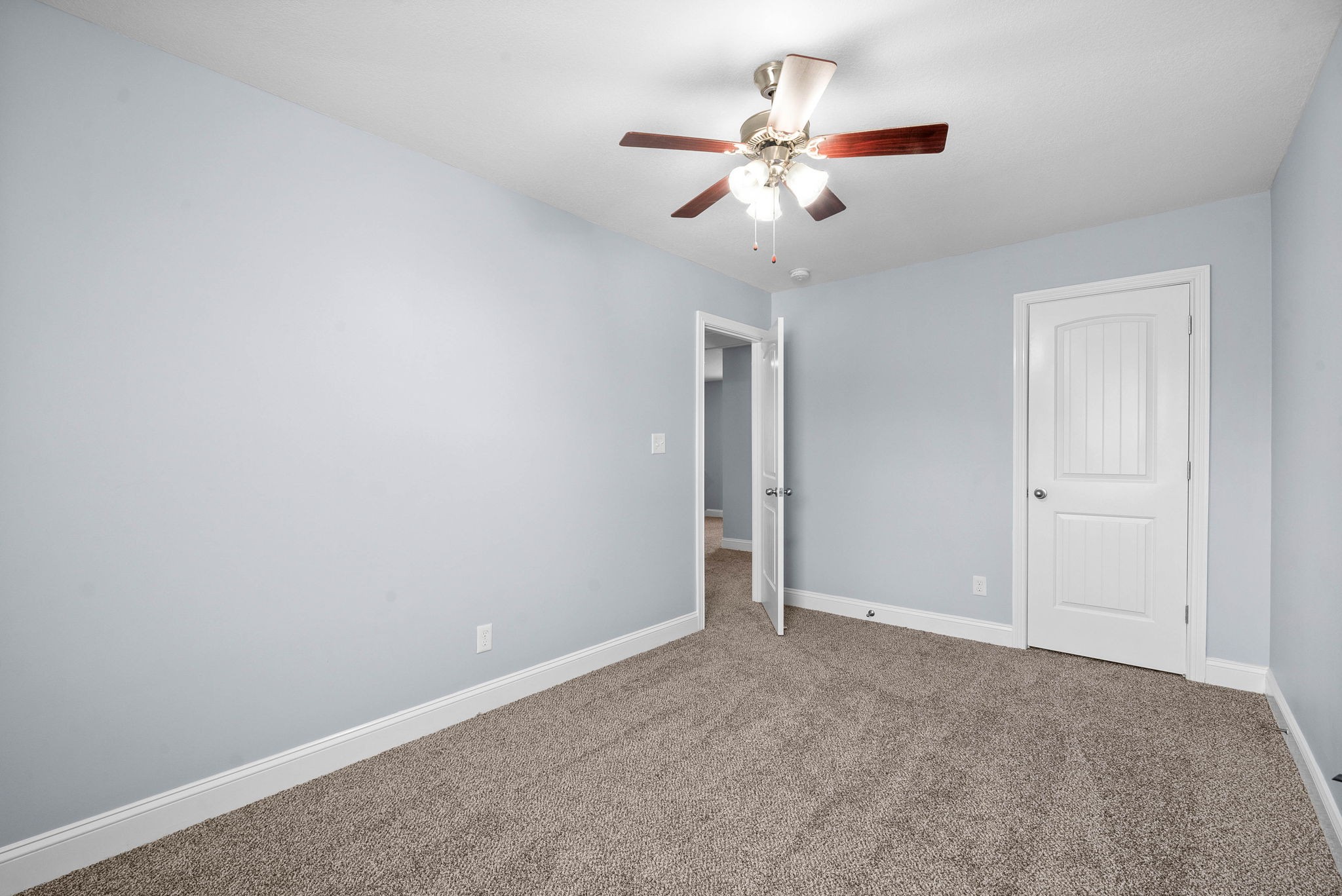 1145 Racker Drive Clarksville, TN 37043 - Photo 28 of 44 a view of an empty room with a chandelier fan