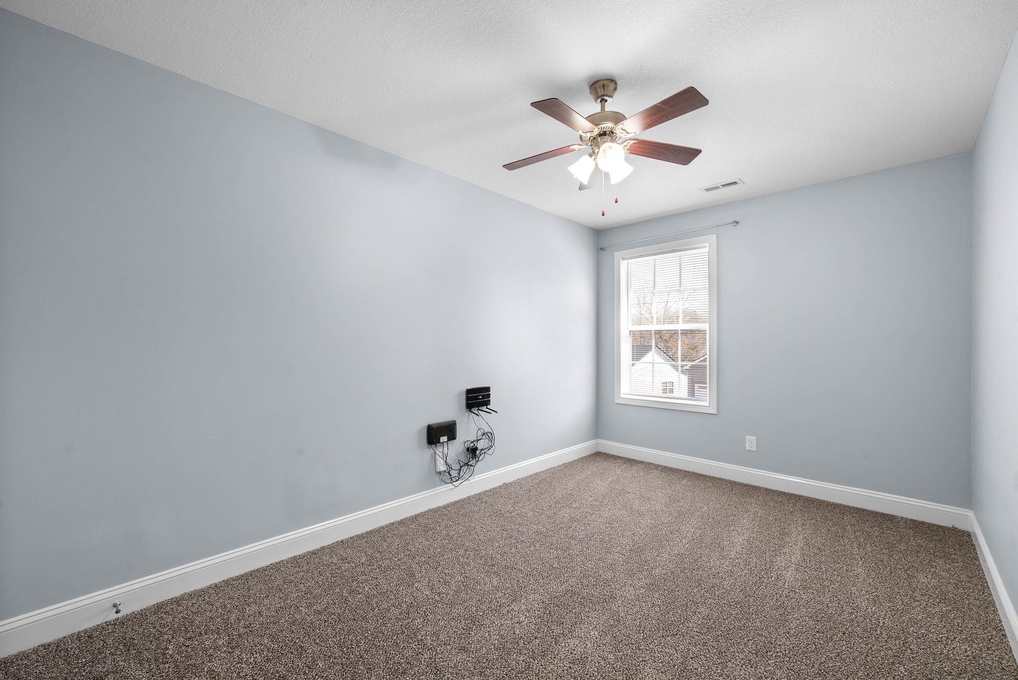 1145 Racker Drive Clarksville, TN 37043 - Photo 29 of 44 a view of room with a ceiling fan and window