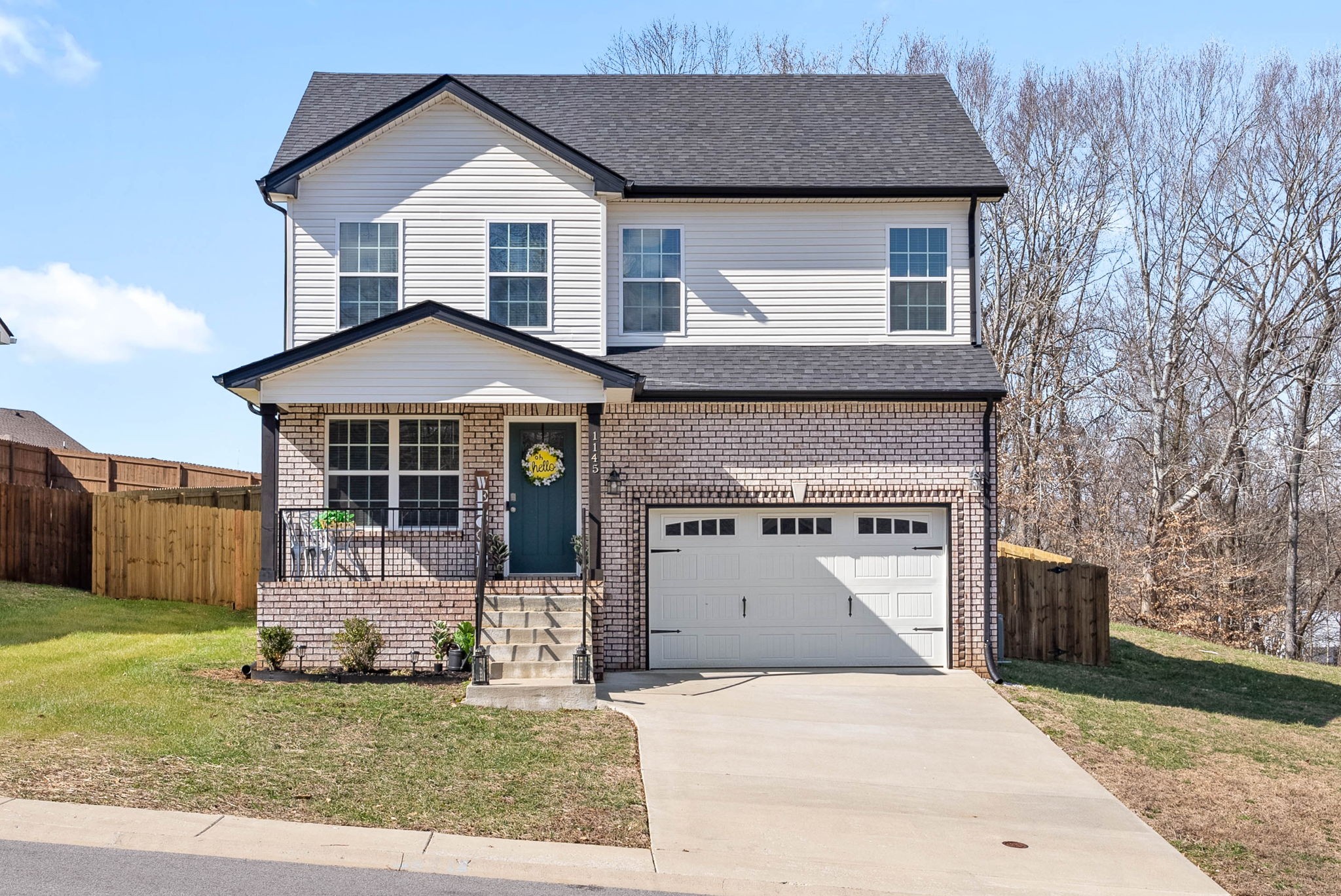 1145 Racker Drive Clarksville, TN 37043 - Photo 44 of 44 a front view of a house with a yard