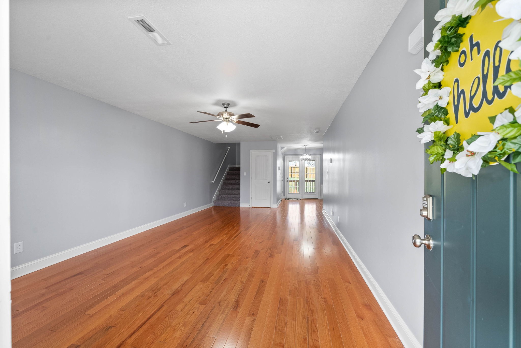 1145 Racker Drive Clarksville, TN 37043 - Photo 6 of 44 a view of an empty room with wooden floor and a window