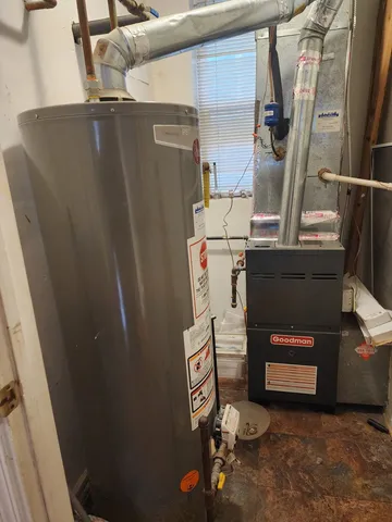 a view of storage and utility room with washer and dryer