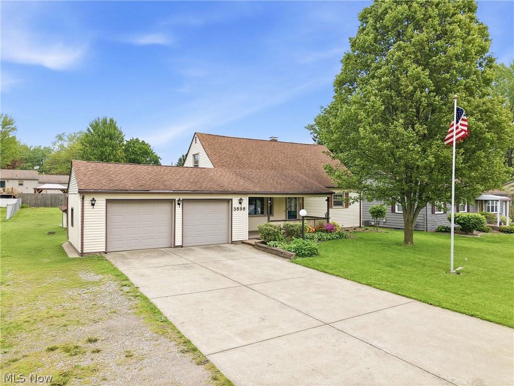 3898 New Road Austintown, OH 44515 - Photo 2 of 45 Concrete driveway with 2 car attached garage & workshop