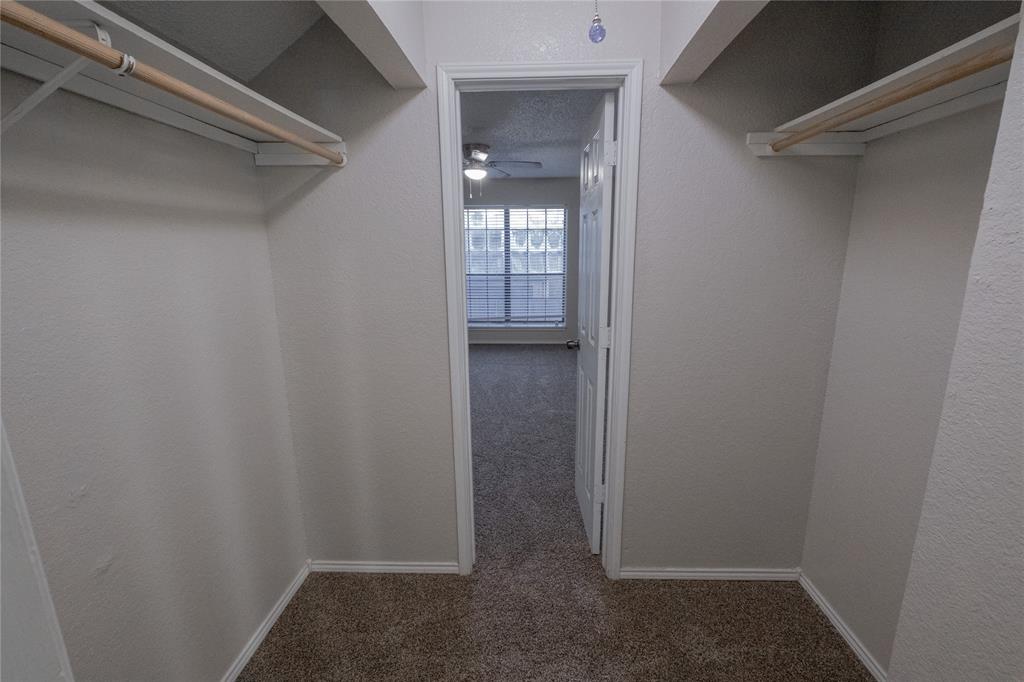 675 Harbor Drive North, Unit C Azle, TX 76020 - Photo 15 of 19 a view of an empty walk in closet
