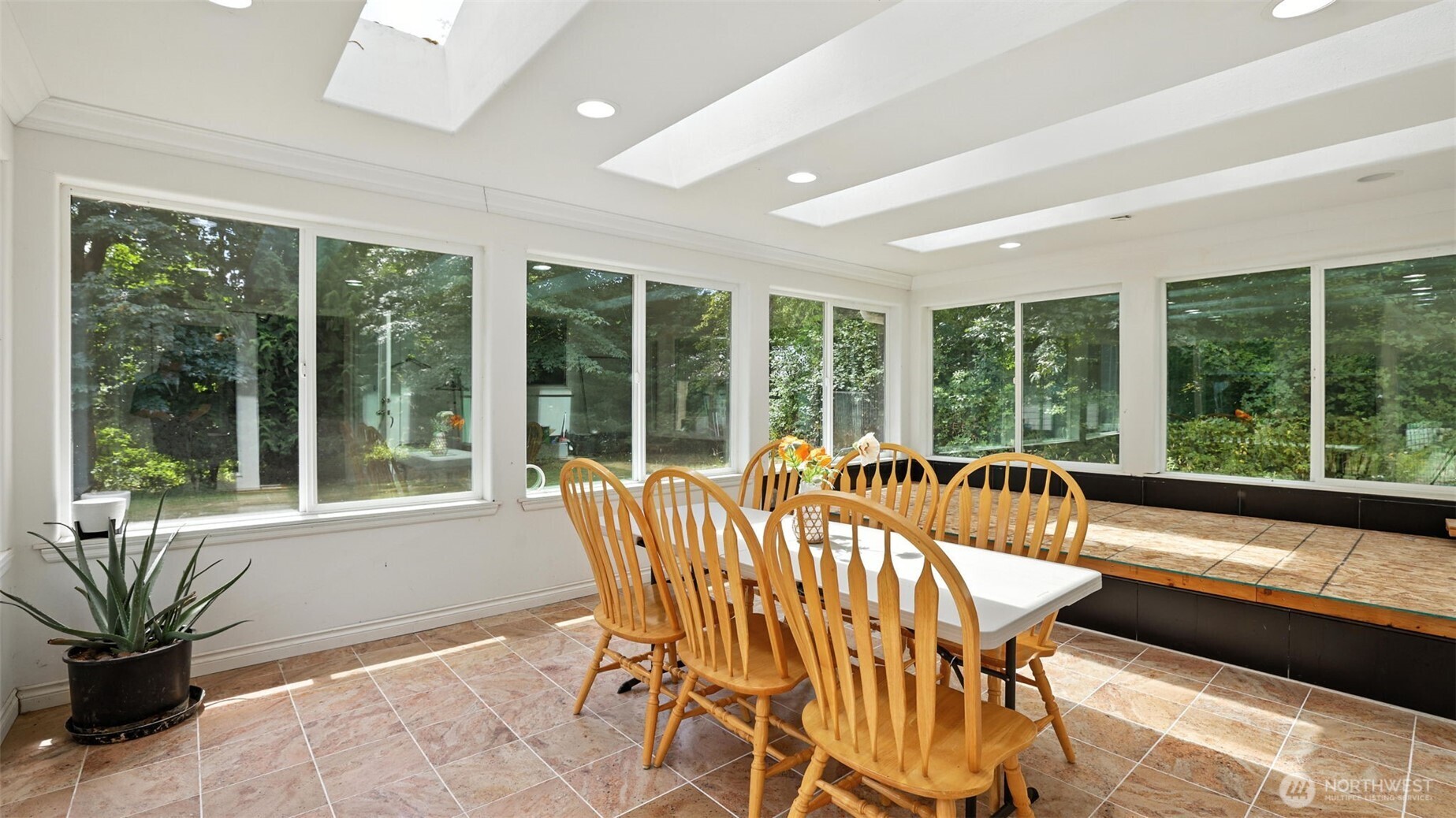18911 Southeast 144th Street Renton, WA 98059 - Photo 18 of 39 a view of a dining room with furniture window and outside view