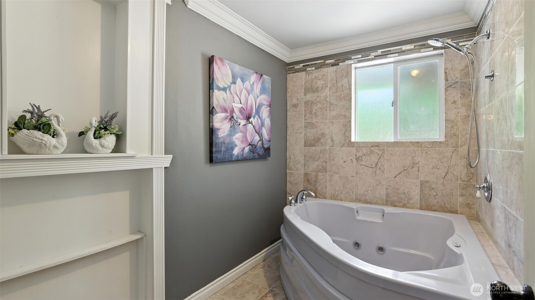 18911 Southeast 144th Street Renton, WA 98059 - Photo 20 of 39 a bathroom with a bathtub and a window
