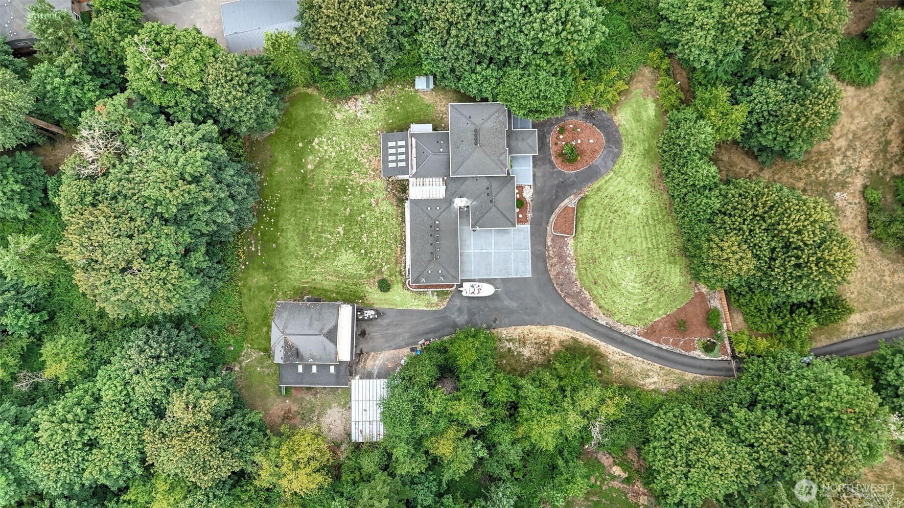 18911 Southeast 144th Street Renton, WA 98059 - Photo 39 of 39 an aerial view of a house with outdoor space and trees all around