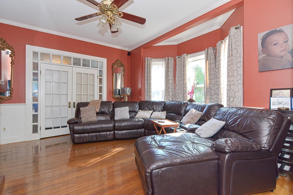 110 Danforth Street Framingham, MA 01701 - Photo 25 of 28 a living room with furniture and a large window