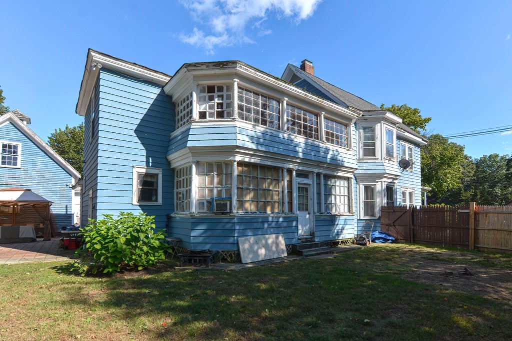 110 Danforth Street Framingham, MA 01701 - Photo 6 of 28 a front view of a house with a yard