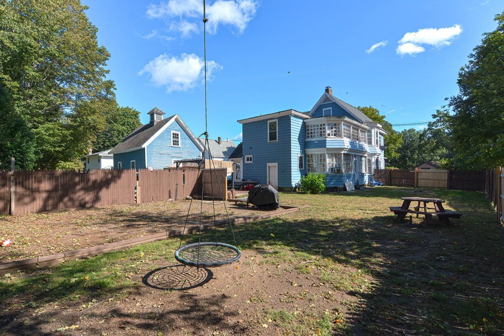 110 Danforth Street Framingham, MA 01701 - Photo 8 of 28 a view of a house with backyard