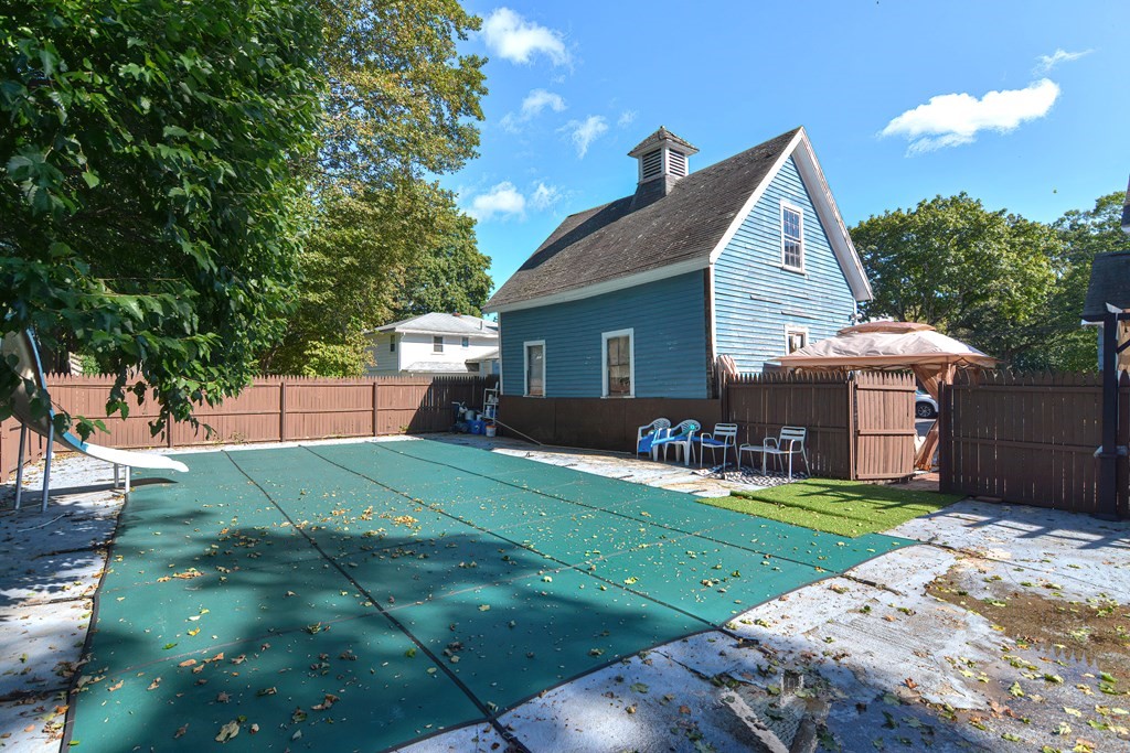 110 Danforth Street Framingham, MA 01701 - Photo 9 of 28 a view of a house with backyard and porch