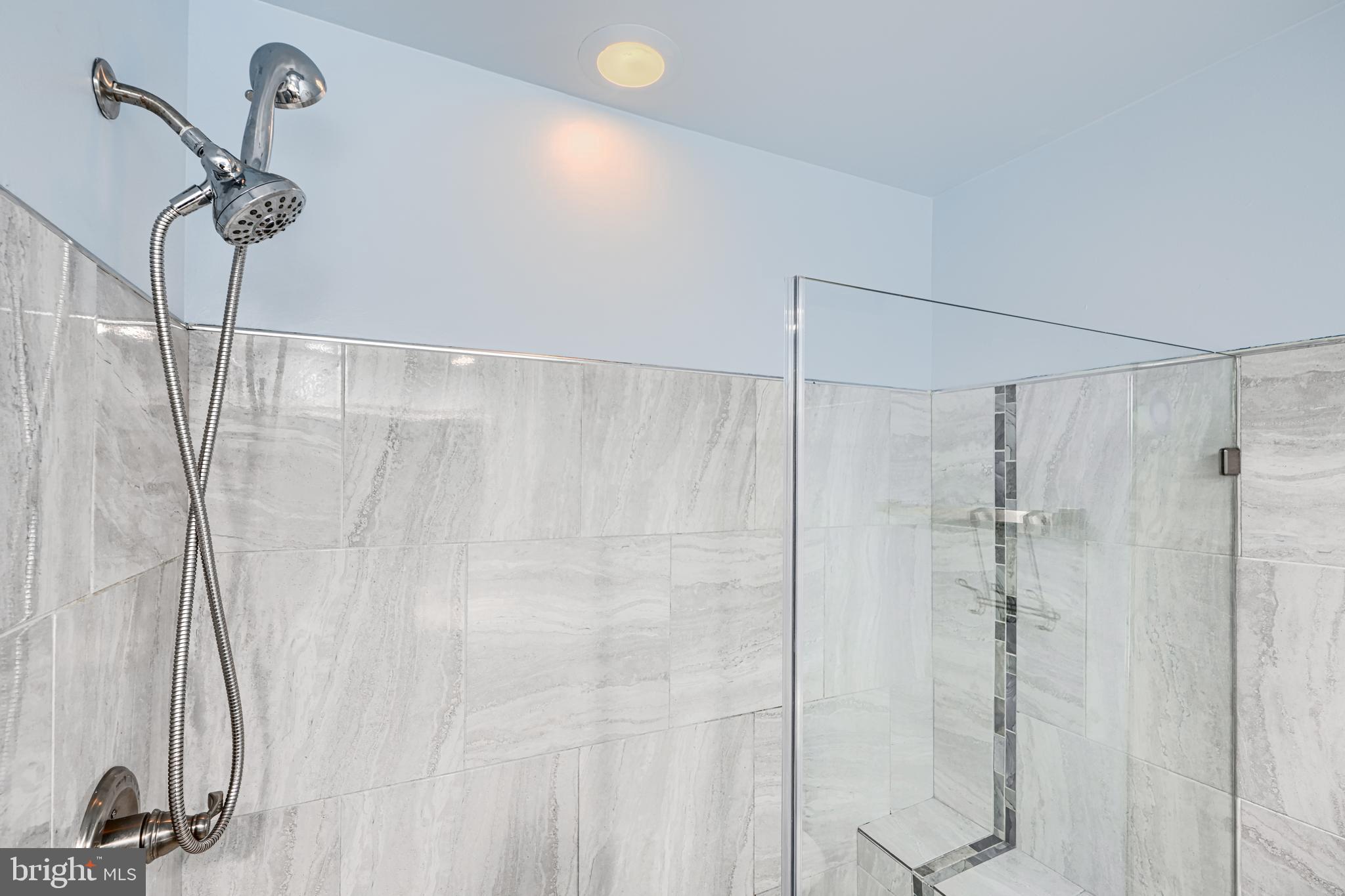 14235 Jib Street, Unit 7342 Laurel, MD 20707 - Photo 13 of 25 a bathroom with a shower