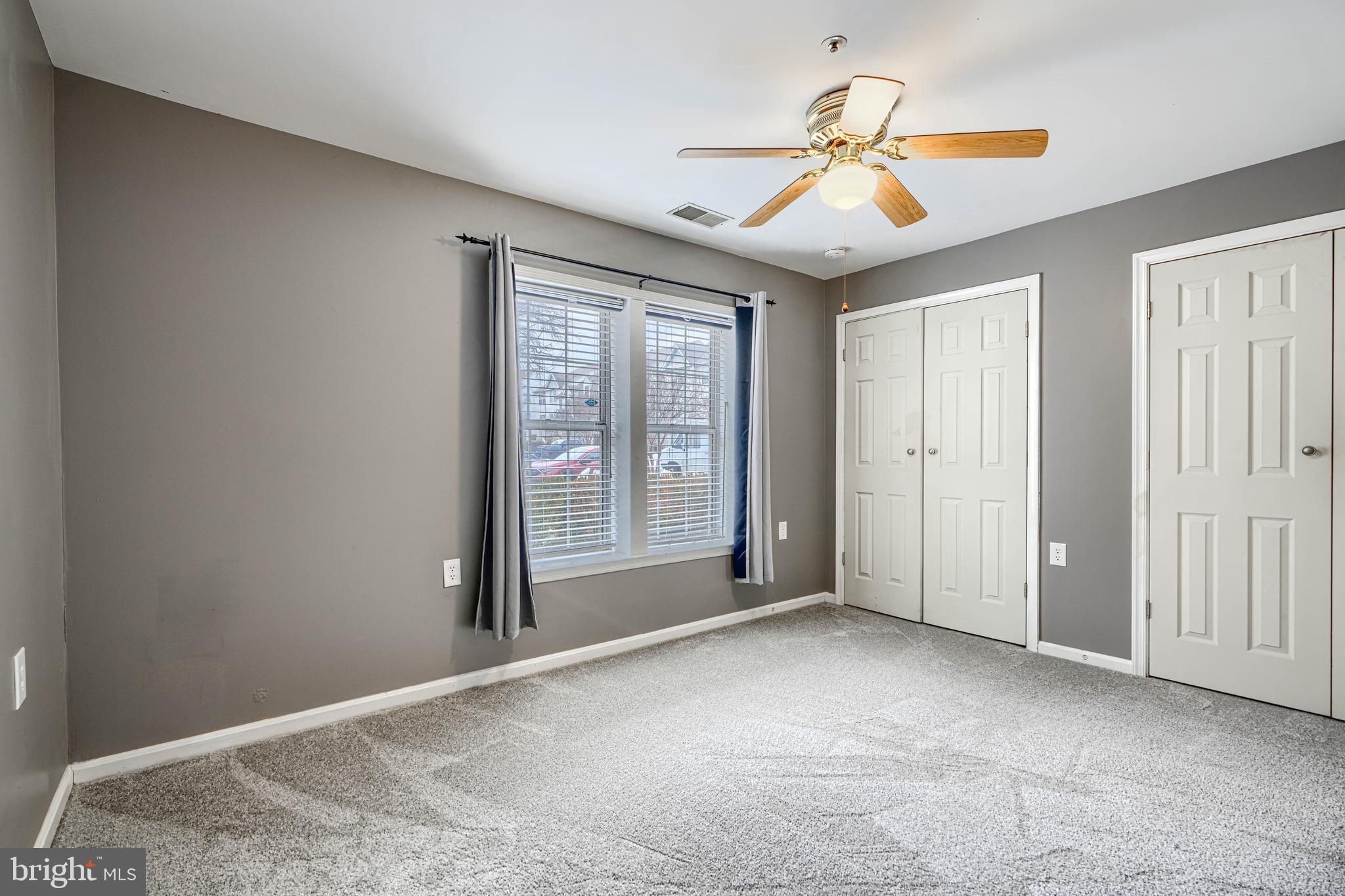 14235 Jib Street, Unit 7342 Laurel, MD 20707 - Photo 10 of 25 a view of an empty room with a window