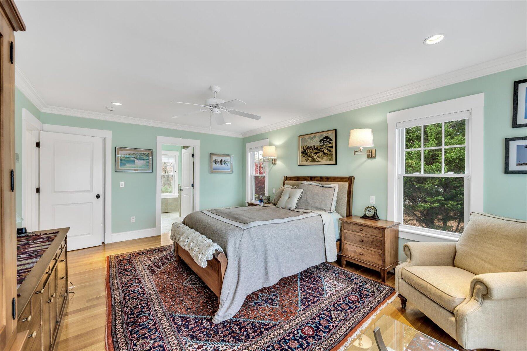 140 Summersea Road Mashpee, MA 02649 - Photo 16 of 39 a bedroom with a large bed and a couch