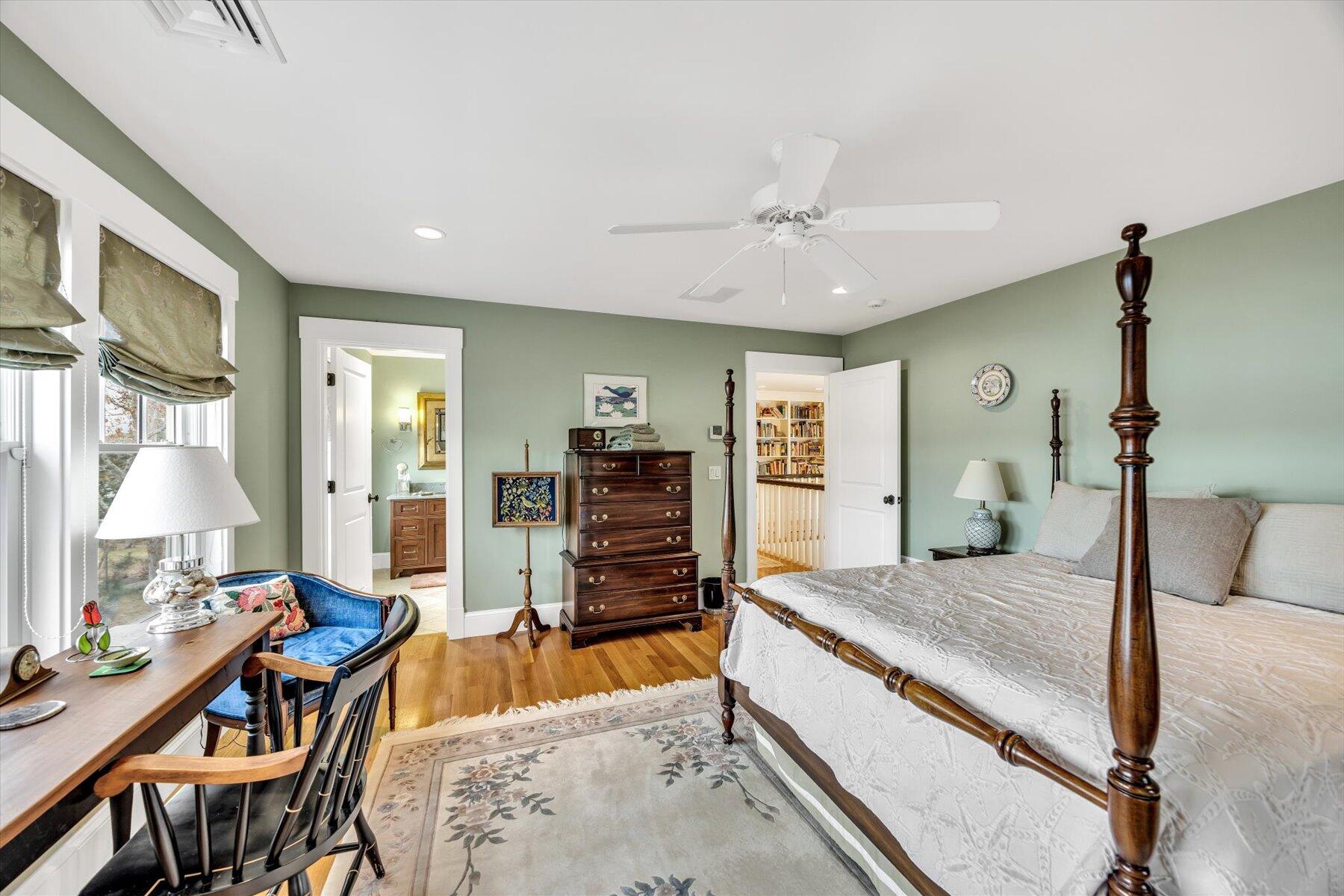 140 Summersea Road Mashpee, MA 02649 - Photo 22 of 39 a bedroom with a bed and wooden floor