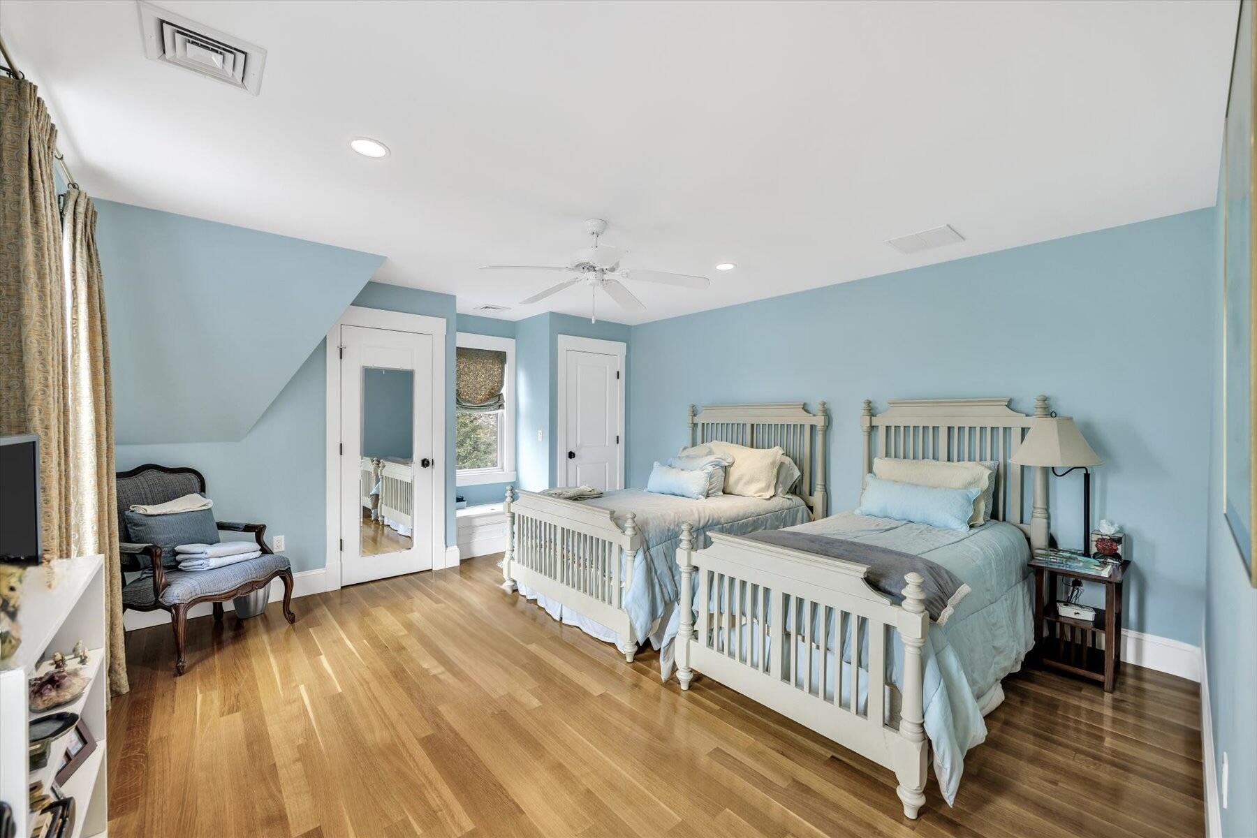 140 Summersea Road Mashpee, MA 02649 - Photo 24 of 39 a bedroom with a bed and wooden floor