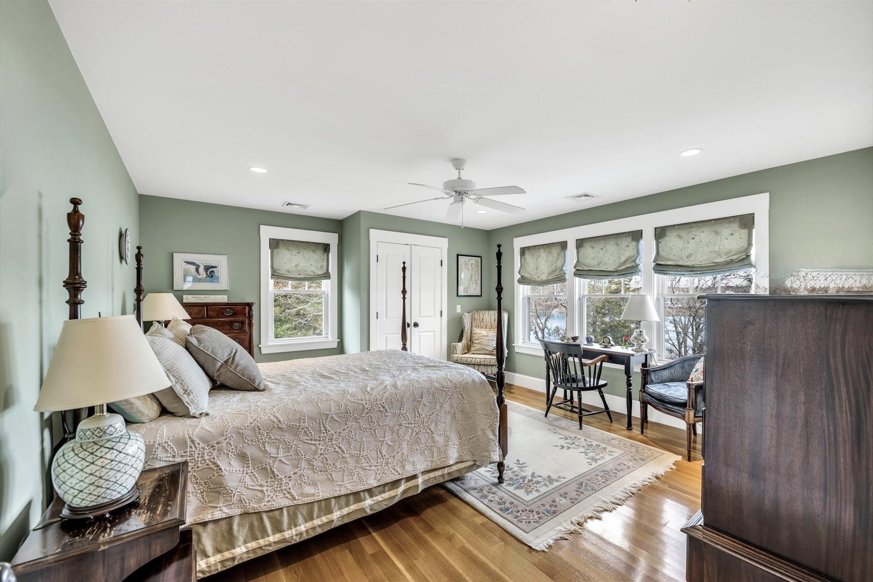 140 Summersea Road Mashpee, MA 02649 - Photo 25 of 39 a bedroom with a bed and wooden floor