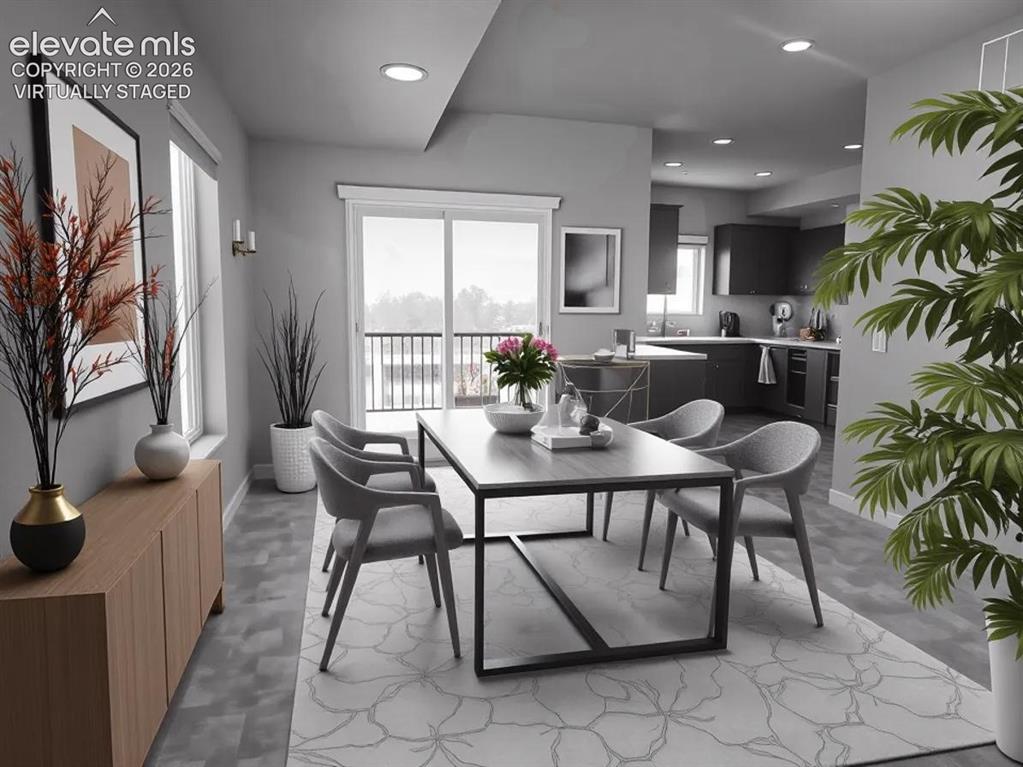 6644 Rawhide Rdg View Colorado Springs, CO 80915 - Photo 8 of 26 a view of a dining room with furniture and window