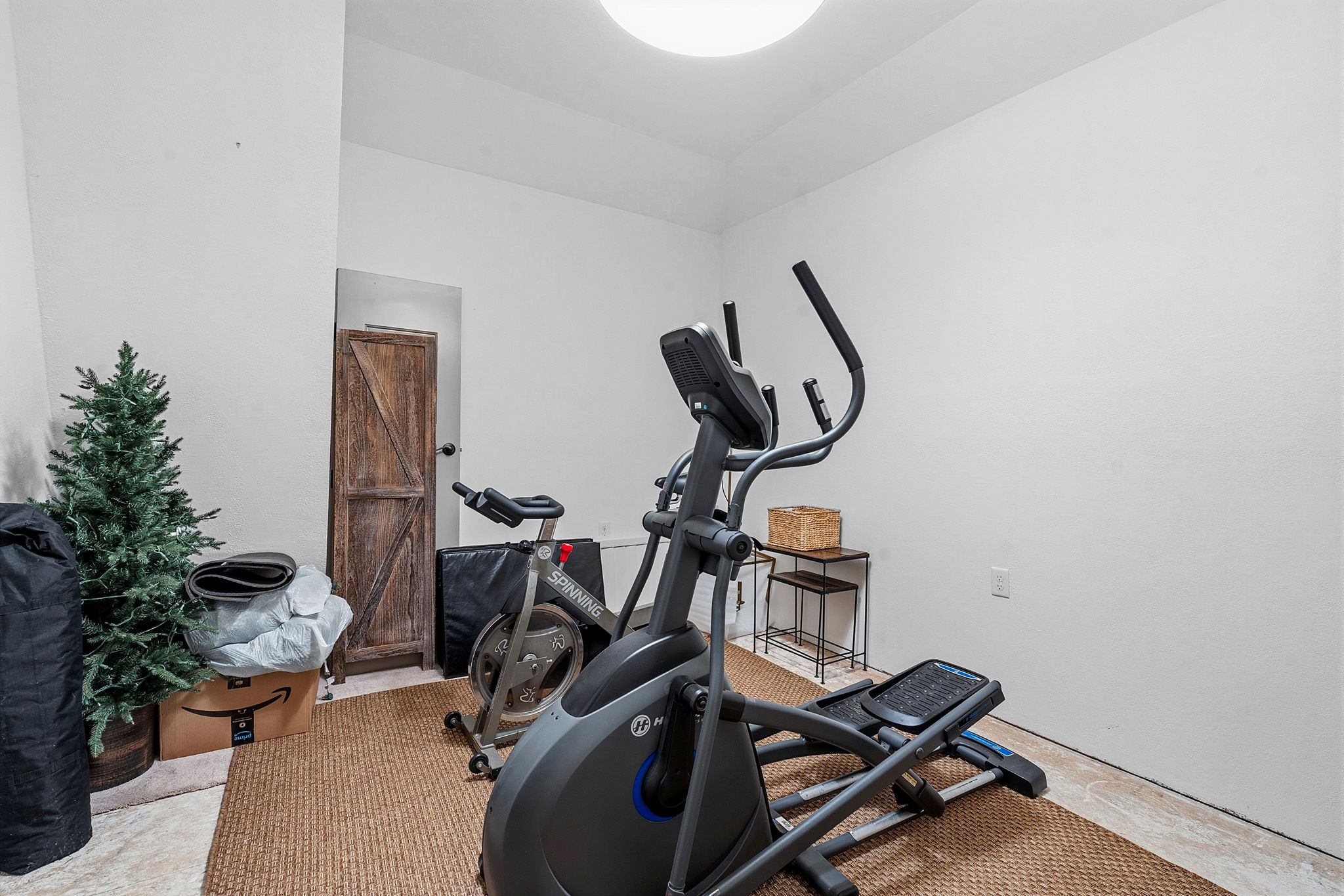 12321 Edenvale Path Austin, TX 78732 - Photo 29 of 36 This area upstairs is perfect for a workout room or tons of extra storage.