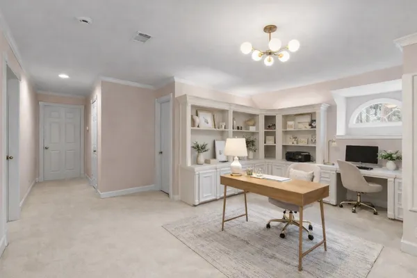 a view of a workspace with furniture