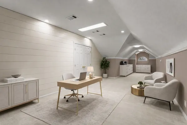 a room with pool table and windows