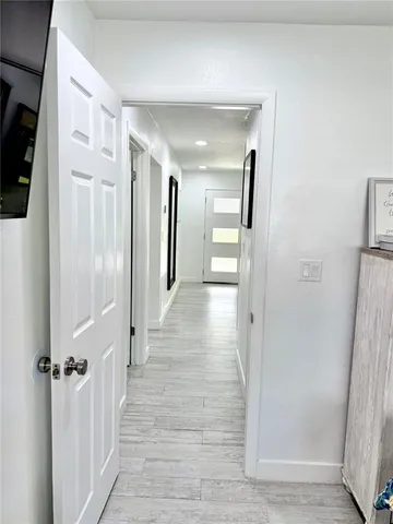 a kitchen with a sink and a stove