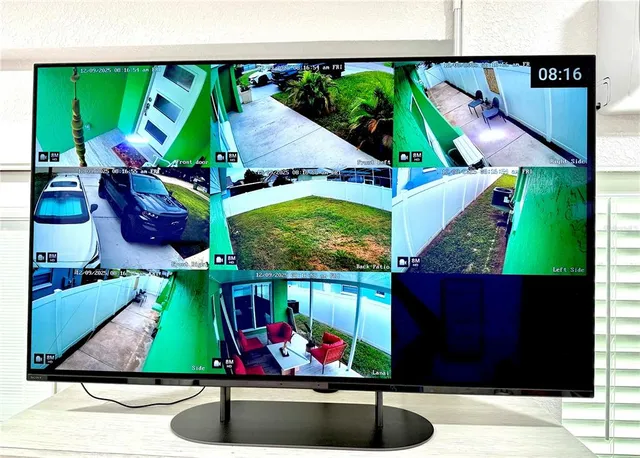 a view of a backyard with a patio