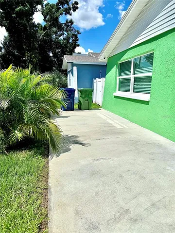 a view of a back yard of the house