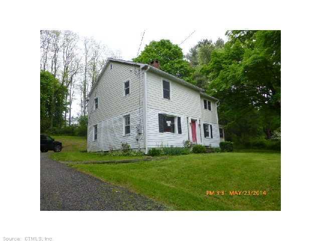 311 South Kent Road Kent, CT 06785 - Photo 1 of 1 a black and white photo of a house
