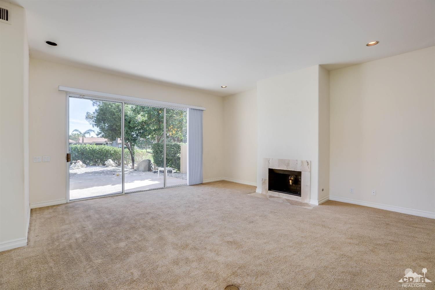 64 Oak Tree Drive Rancho Mirage, CA 92270 - Photo 11 of 31 a view of empty room with front door