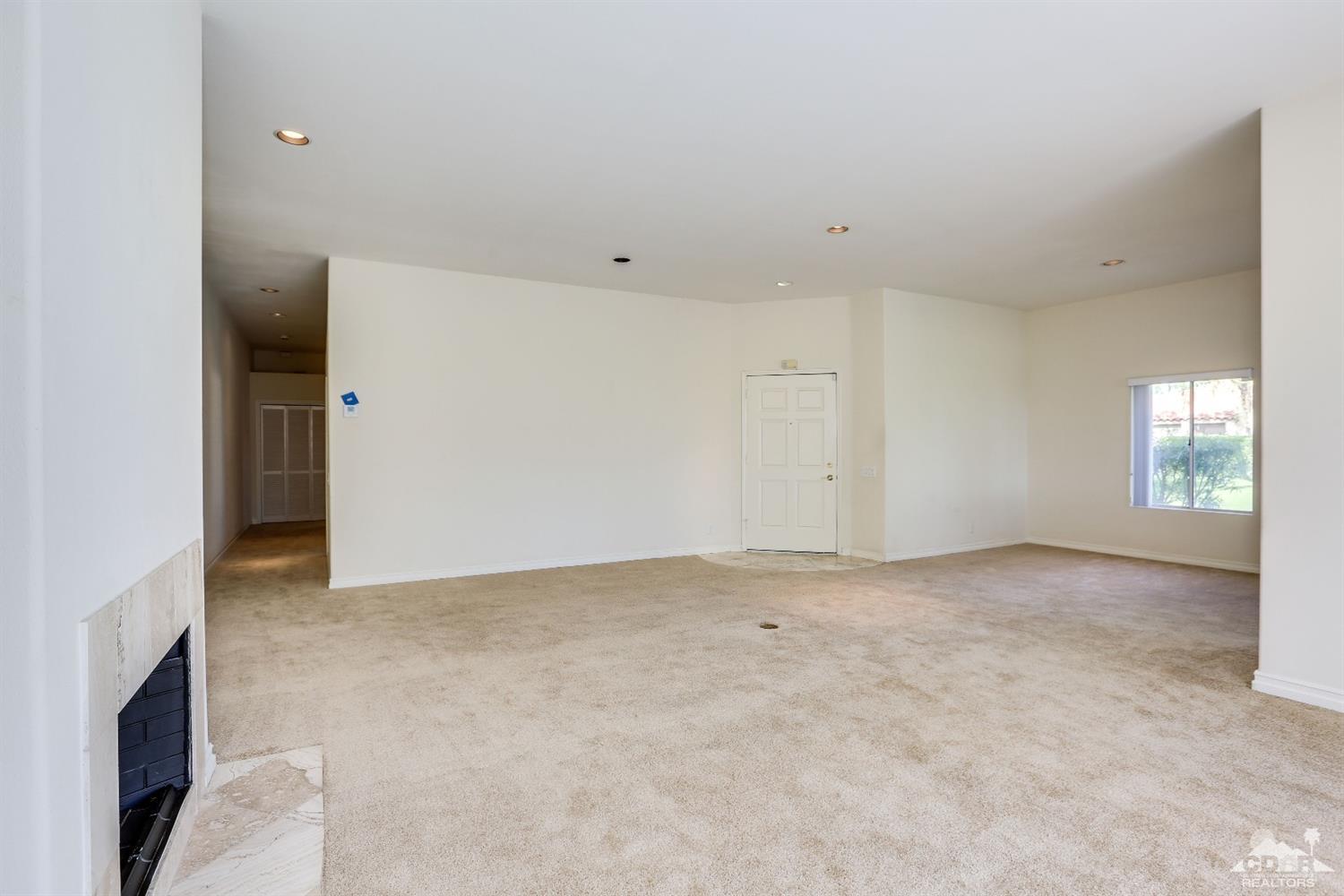 64 Oak Tree Drive Rancho Mirage, CA 92270 - Photo 13 of 31 a view of an empty room