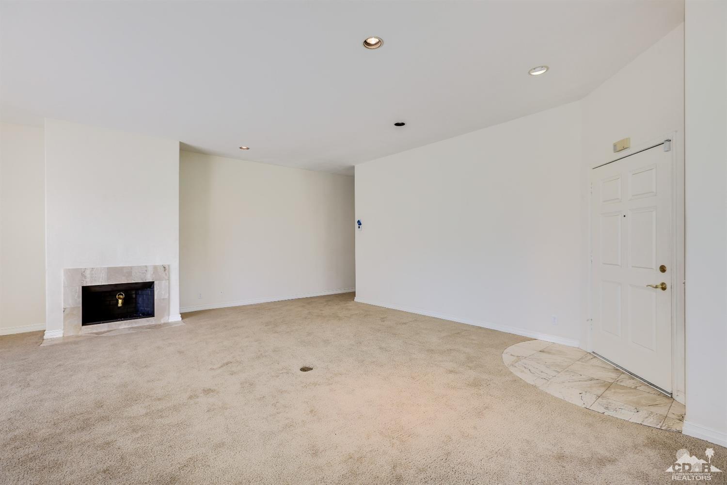 64 Oak Tree Drive Rancho Mirage, CA 92270 - Photo 9 of 31 a view of an empty room