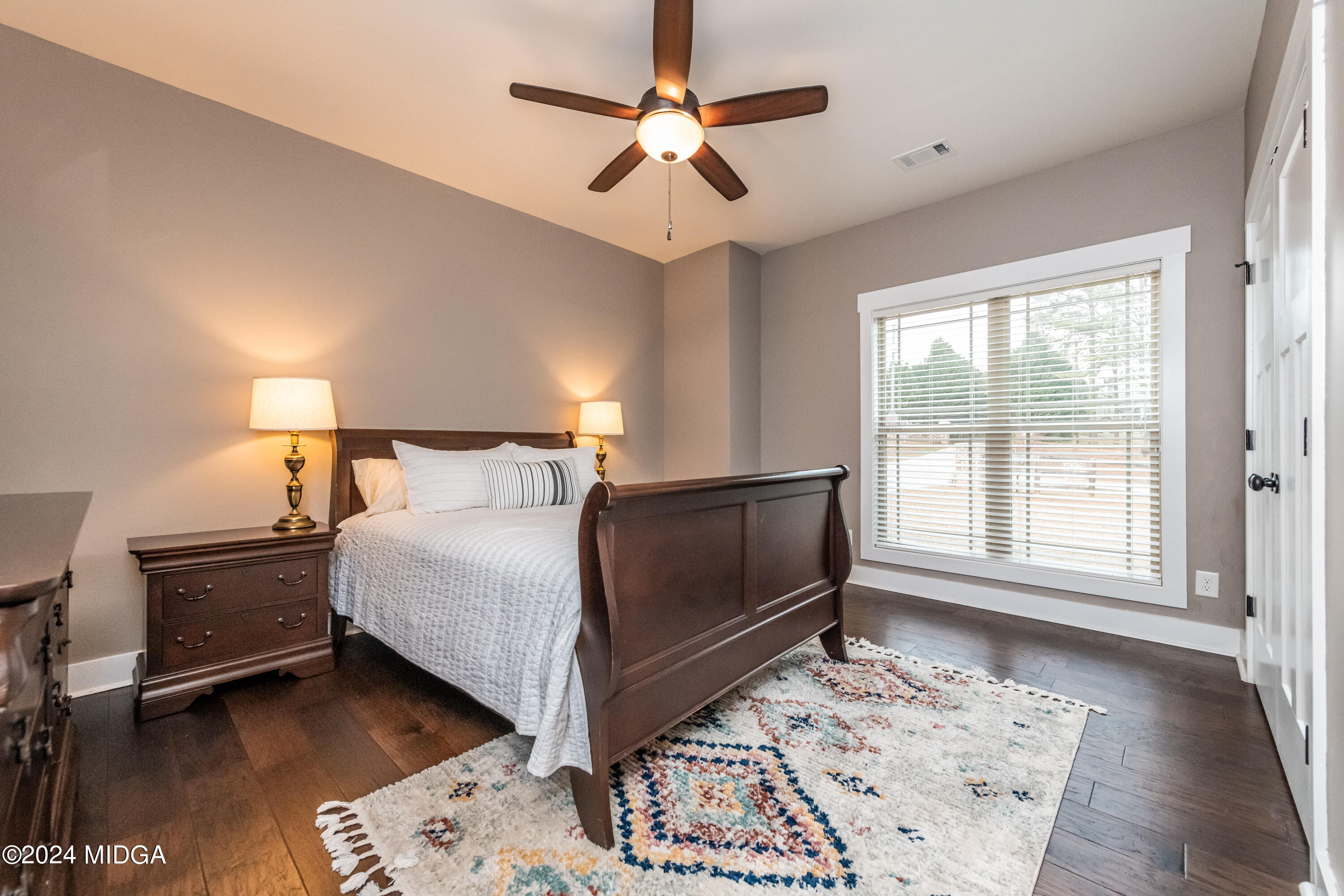 158 Harper Road Perry, GA 31069 - Photo 20 of 46 a bedroom with a bed and a window